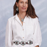 Brighton Fandango Concho Belt with silver oval conchos on brown leather worn by model