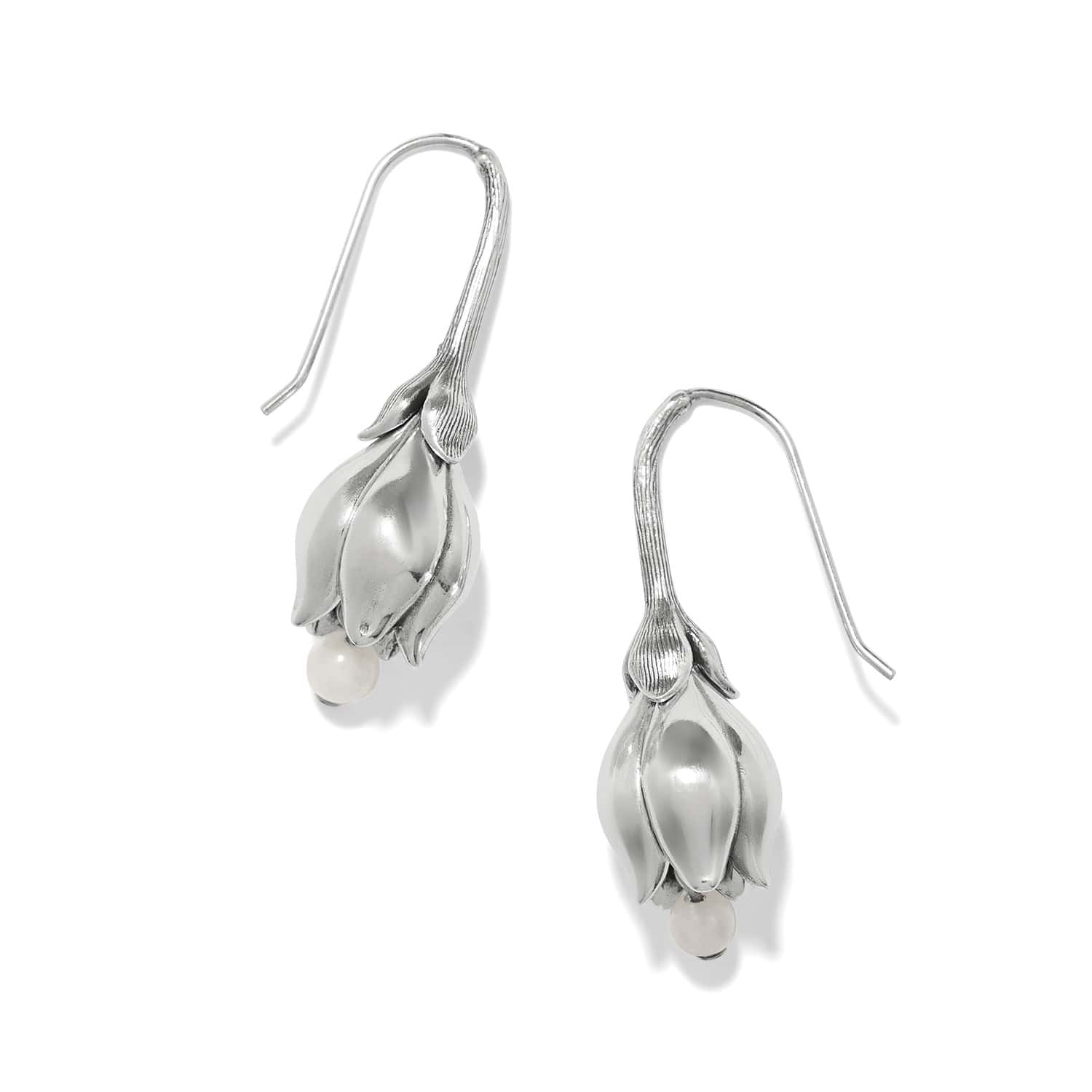 Silver tulip-shaped drop earrings with French wire hooks on white background