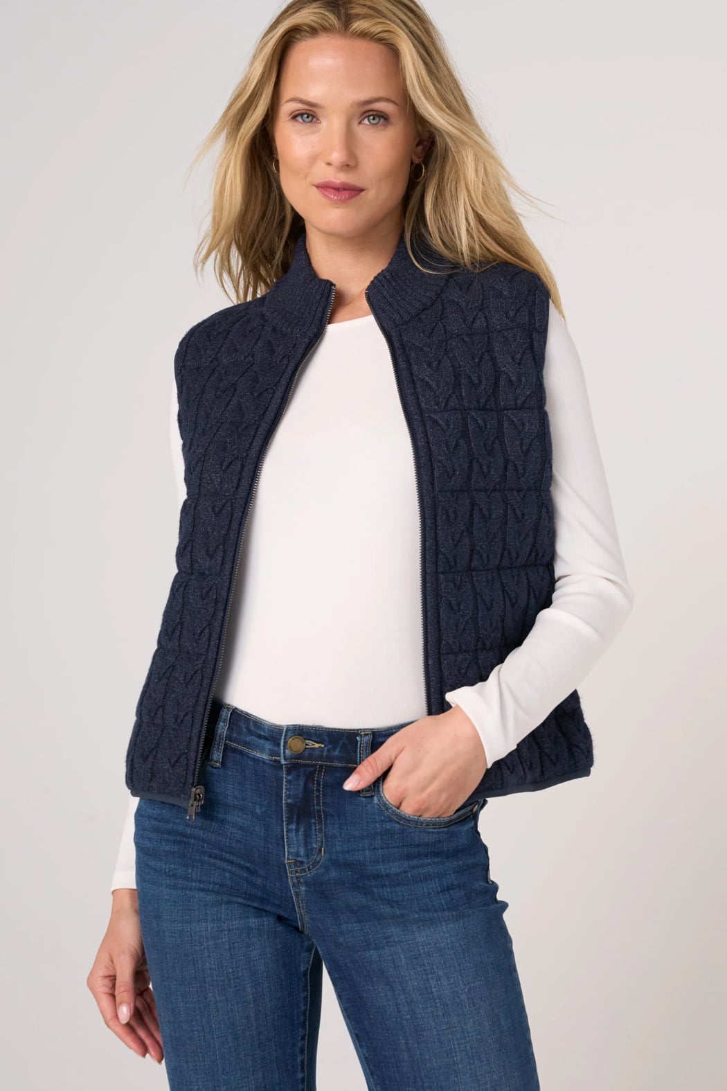 Liverpool Reversible Zip Front Quilted Sweater Vest in Heather Navy on blonde model