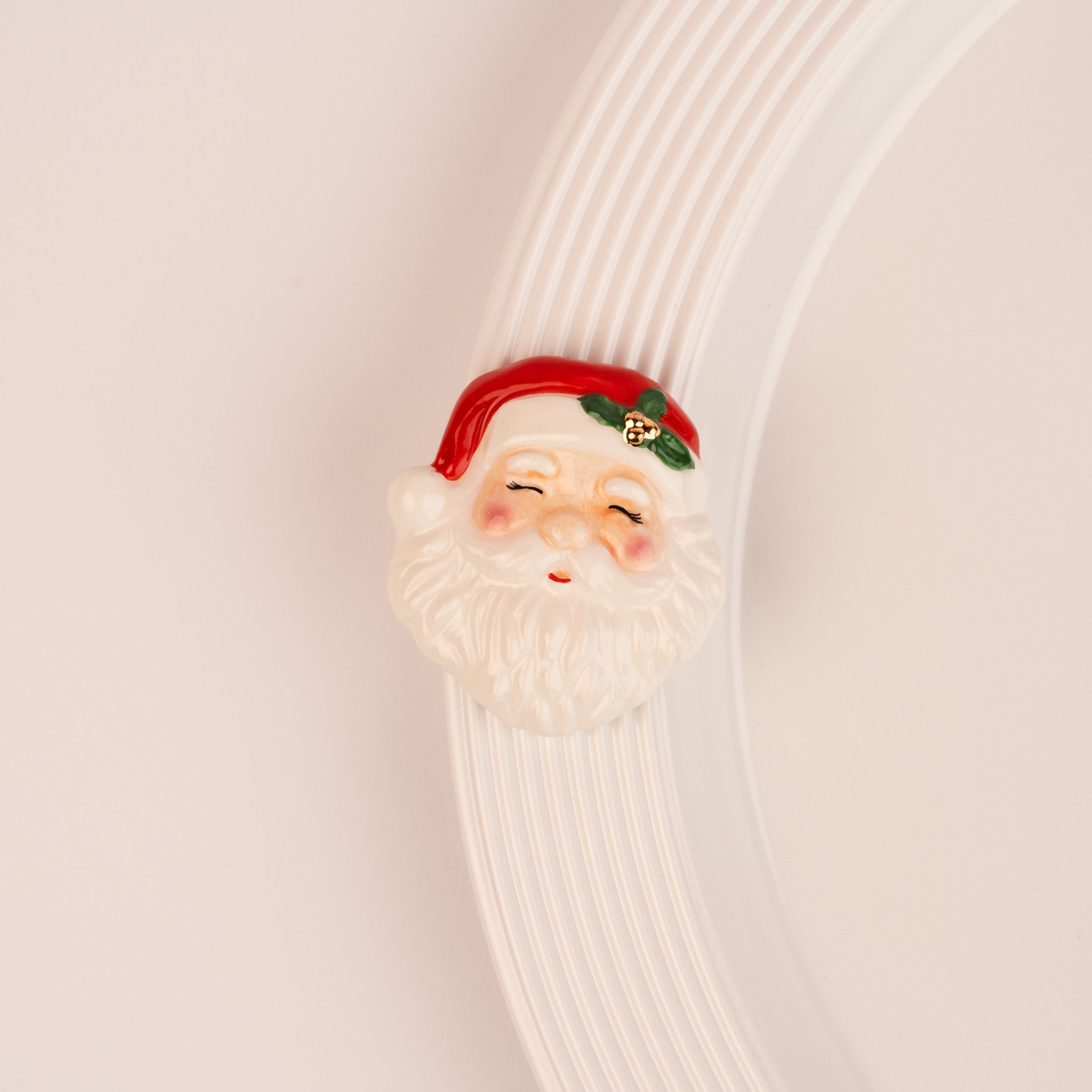 Nora Fleming Jolly Old Soul mini Santa face figurine on white ridged platter edge