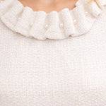 Pearled Ruffle Neckline Tweed Top in ivory at ooh la la! in Grapevine TX 76051
