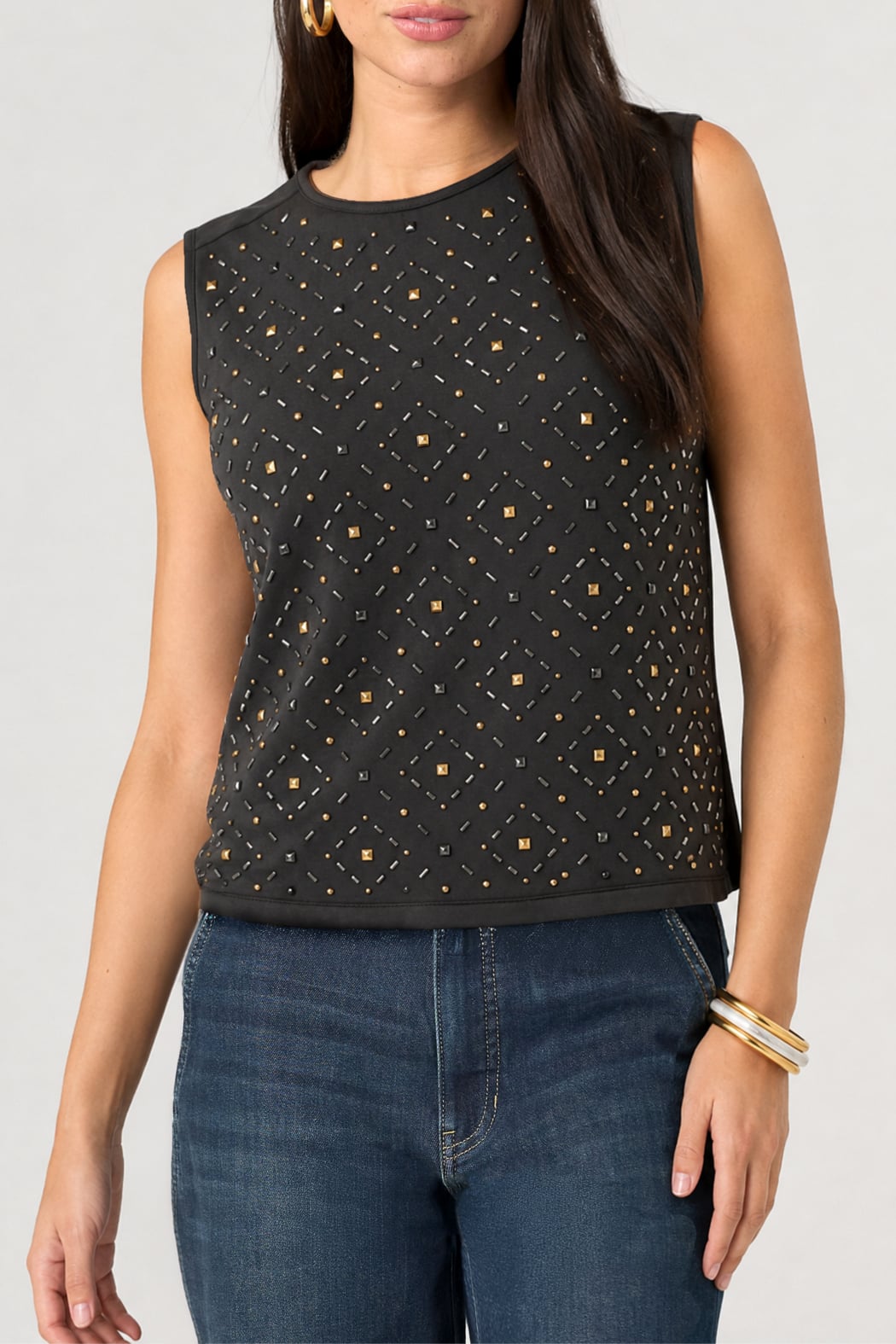 Liverpool black sleeveless embellished knit to woven top with gold studs paired with jeans