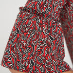 Liverpool Red Geo-Print Flared Half Sleeve Knit Top at ooh la la! in Grapevine TX 76051