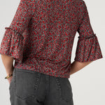 Liverpool Red Geo-Print Flared Half Sleeve Knit Top at ooh la la! in Grapevine TX 76051