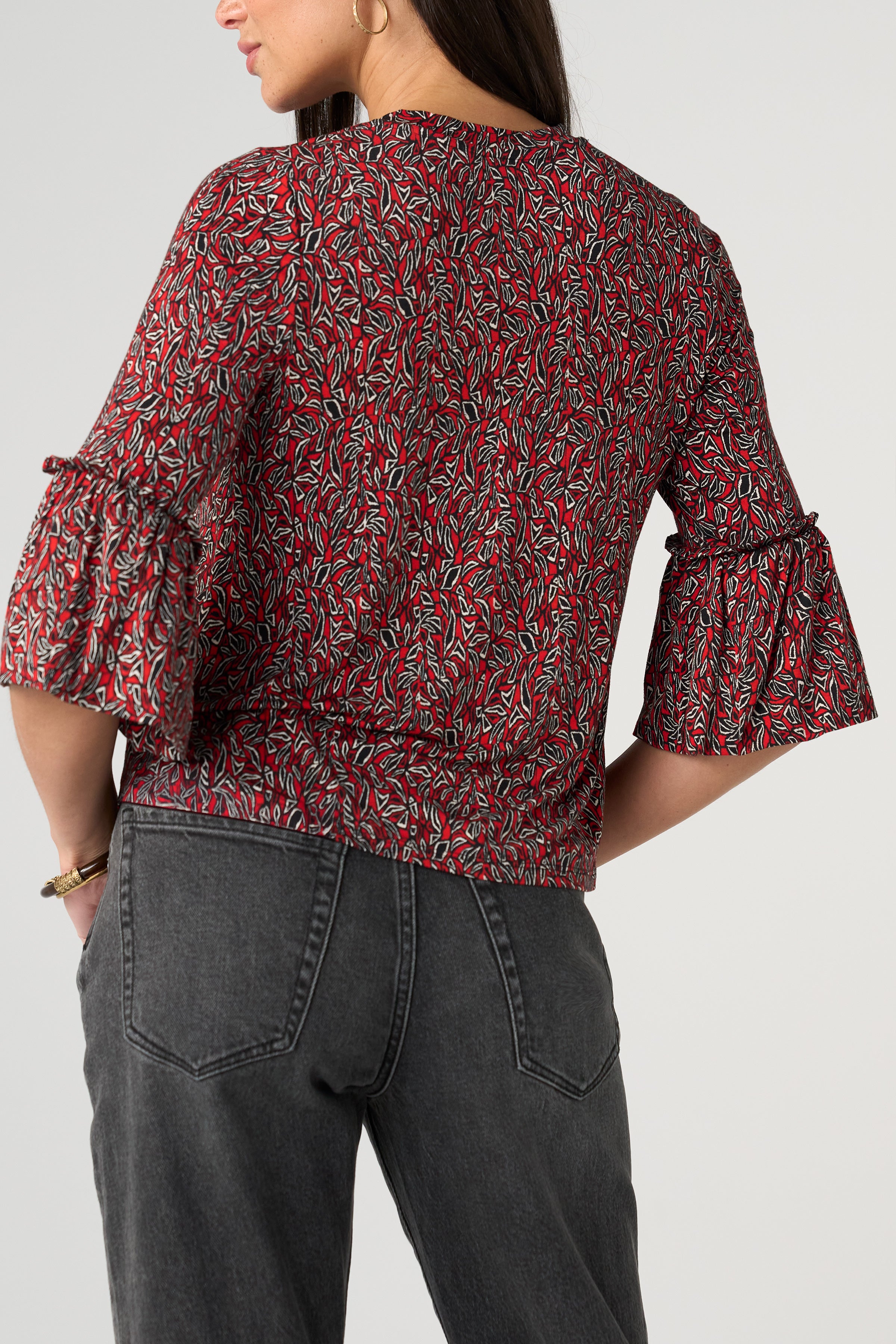 Liverpool Red Geo-Print Flared Half Sleeve Knit Top at ooh la la! in Grapevine TX 76051
