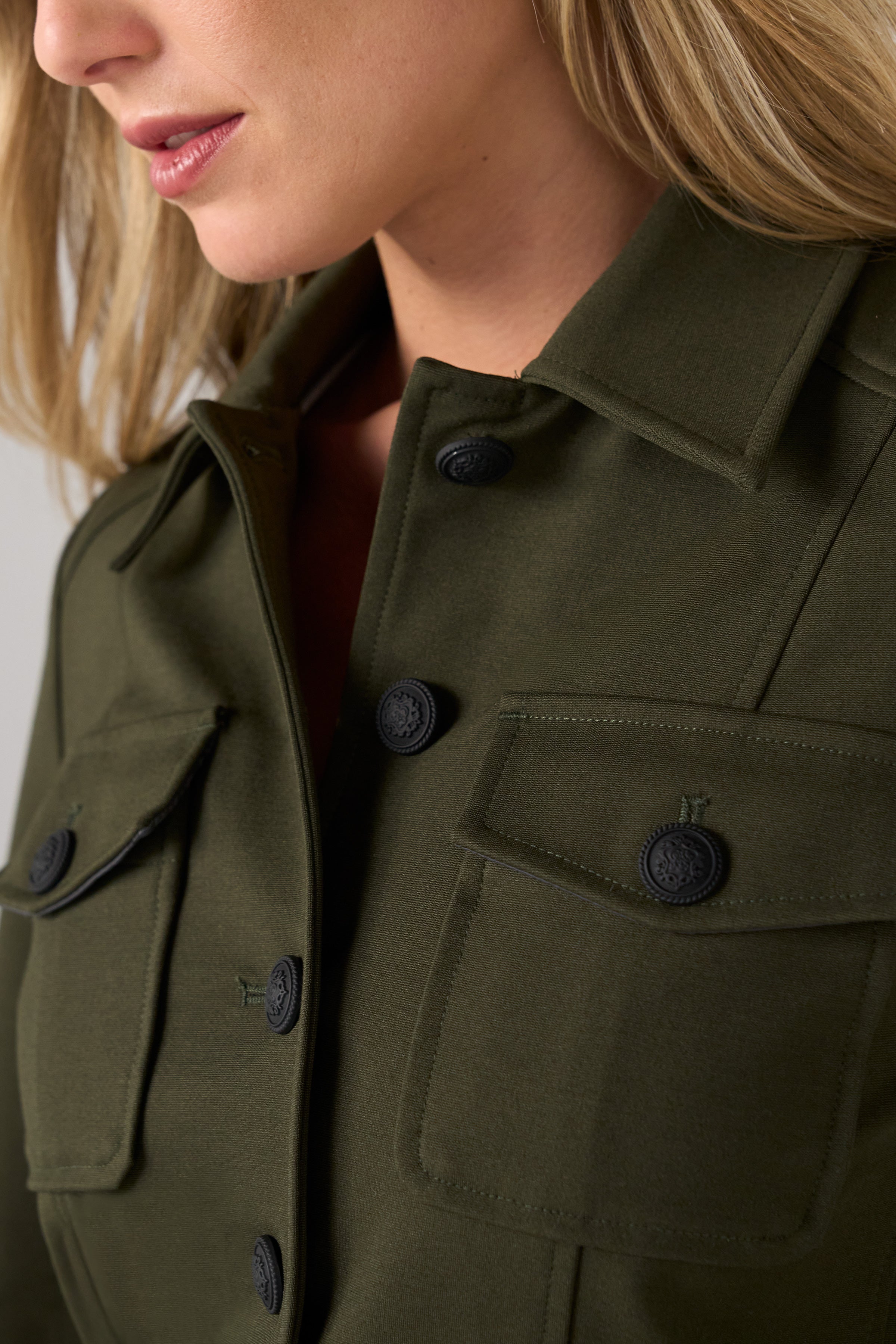 Liverpool Peplum Jacket in Hunter Green at ooh la la! in Grapevine TX 76051