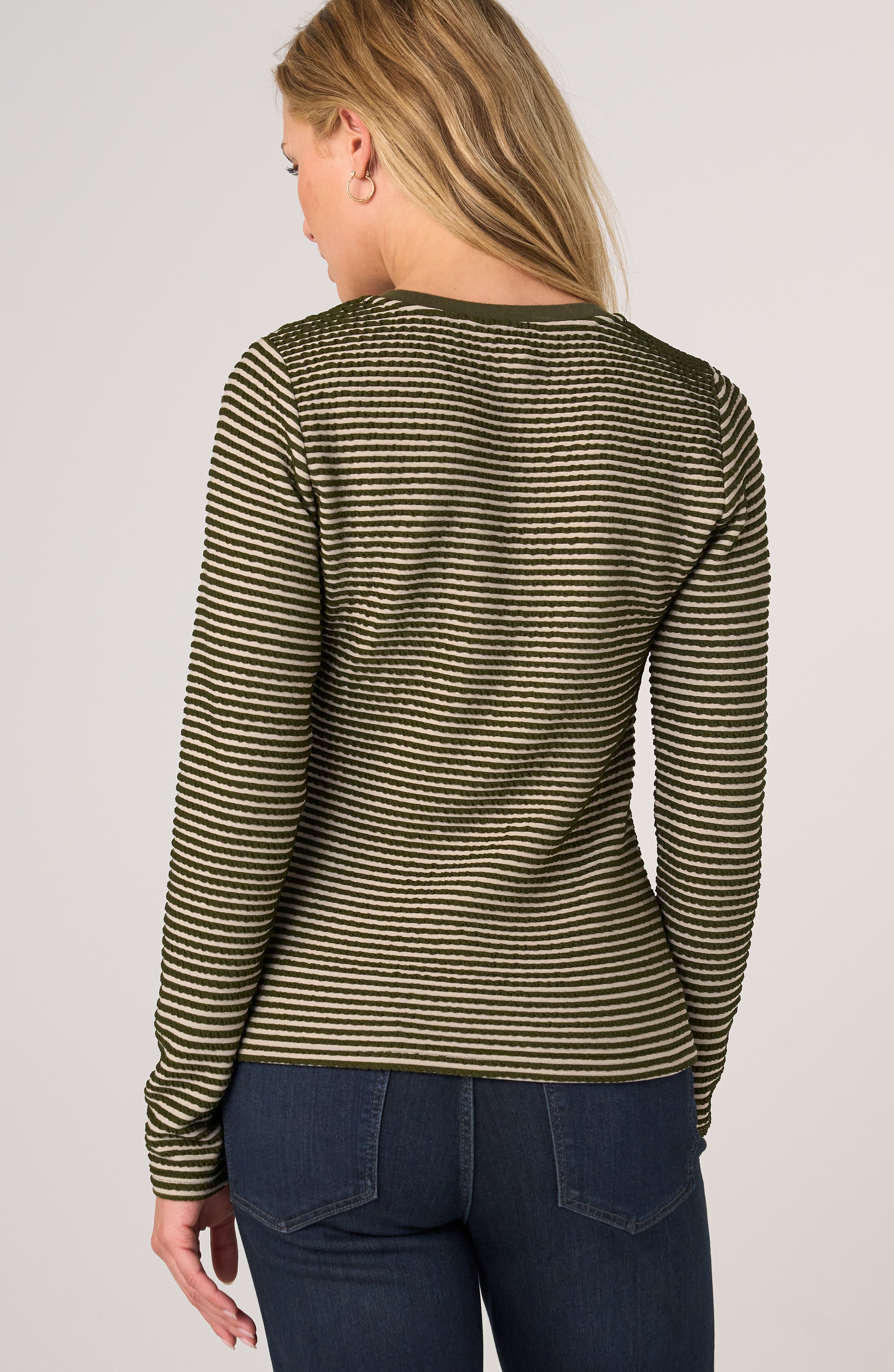 Liverpool long sleeve knit henley top in olive cream stripe, back view on model