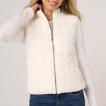 Liverpool Reversible Zip Front Quilted Sweater Vest in cream, worn over white long-sleeve top with jeans