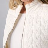 Liverpool cream cable-knit reversible zip-front sweater vest on female model, close-up detail view