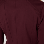 Liverpool Peplum Jacket in dark oxblood shown from back view on blonde model