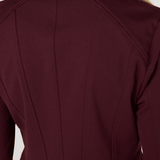 Liverpool Peplum Jacket in dark oxblood shown from back view on blonde model