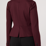 Liverpool Peplum Jacket in dark oxblood shown from rear angle on female model
