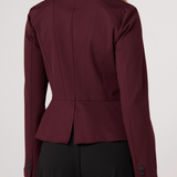 Liverpool Peplum Jacket in dark oxblood shown from rear angle on female model
