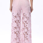 Lavender pink Wide leg jeans, floral lace denim, rhinestone jeans, high rise wide leg, pastel yellow jeans, pink lace jeans, statement denim, women’s high stretch jeans. at ooh la la! in Grapevine TX 76051