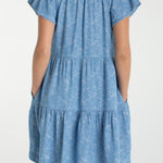 Liverpool Los Angeles, denim dress, floral mini dress, tiered dress with pockets, indigo roses, summer flutter sleeve dress, light wash denim dress, feminine casual style. at ooh la la! in 
Grapevine TX 76051