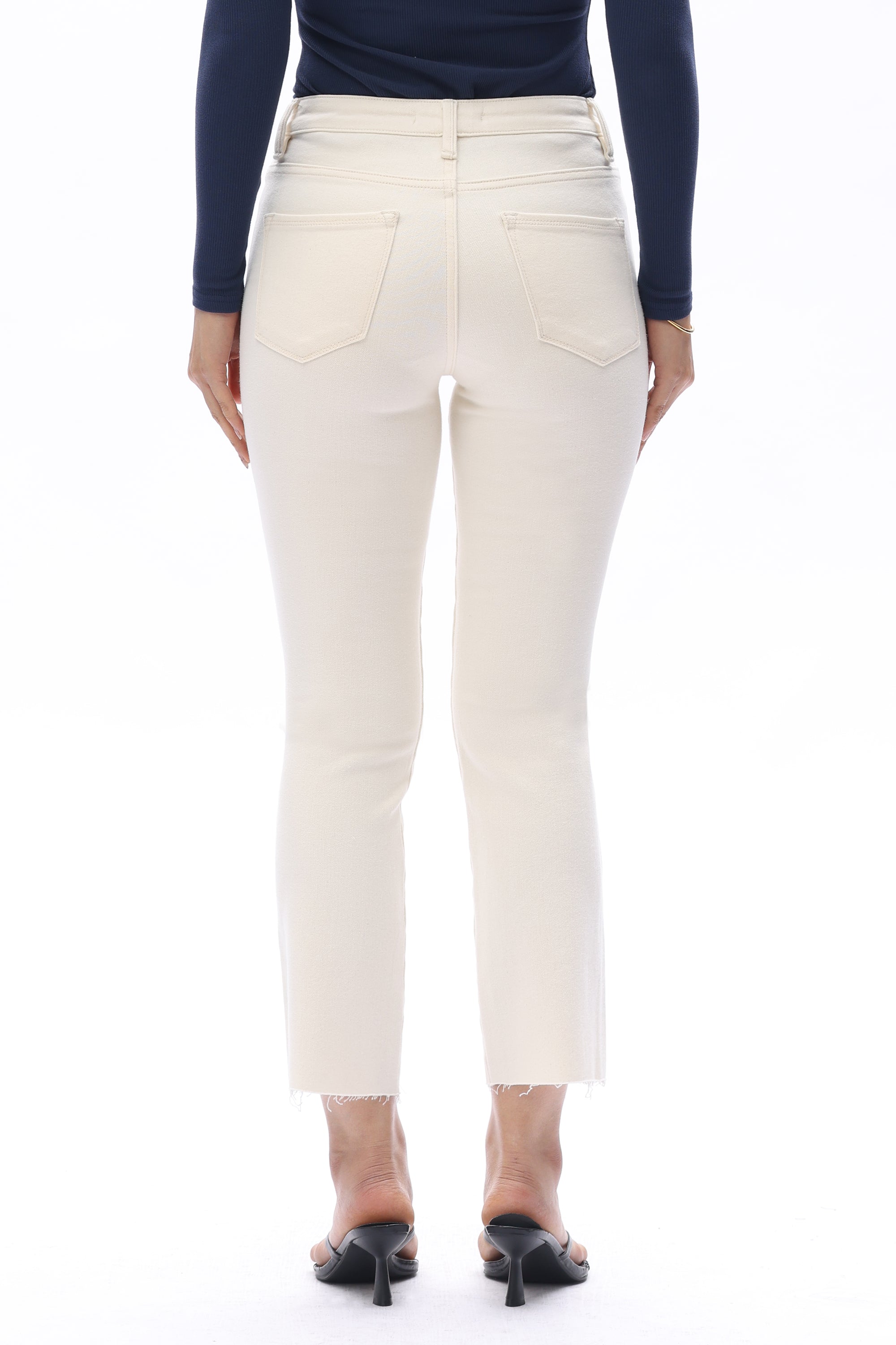 Off-white jeans, mid-rise straight leg, raw hem denim, women’s stretch jeans, cropped straight jeans, white denim trousers, chic casual wear. at ooh la la in Grapevine TX 76051