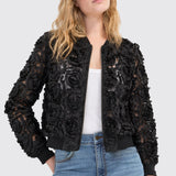 Liverpool black rosette bomber jacket styled with white tank and blue jeans on model