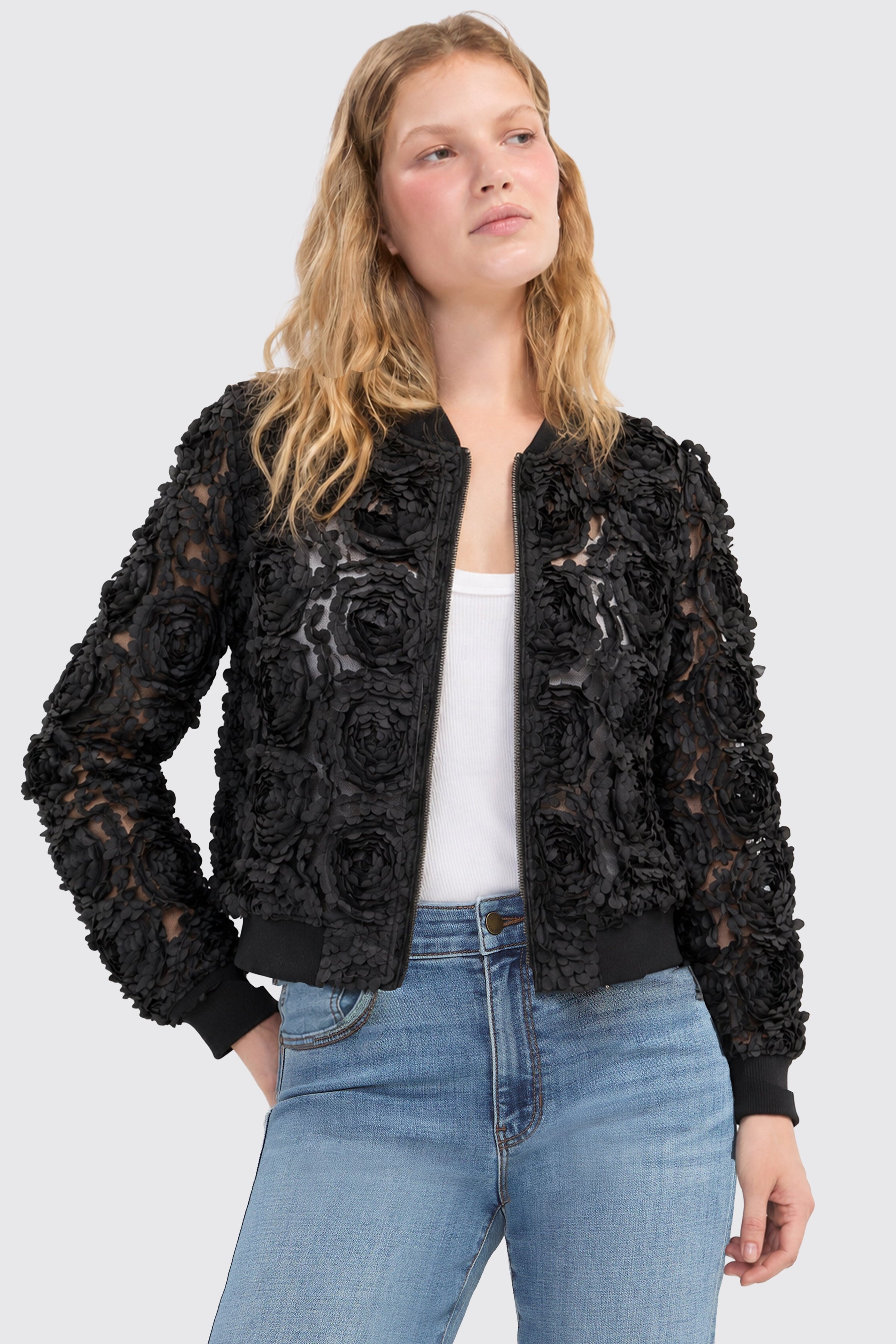 Liverpool black rosette bomber jacket styled with white tank and blue jeans on model