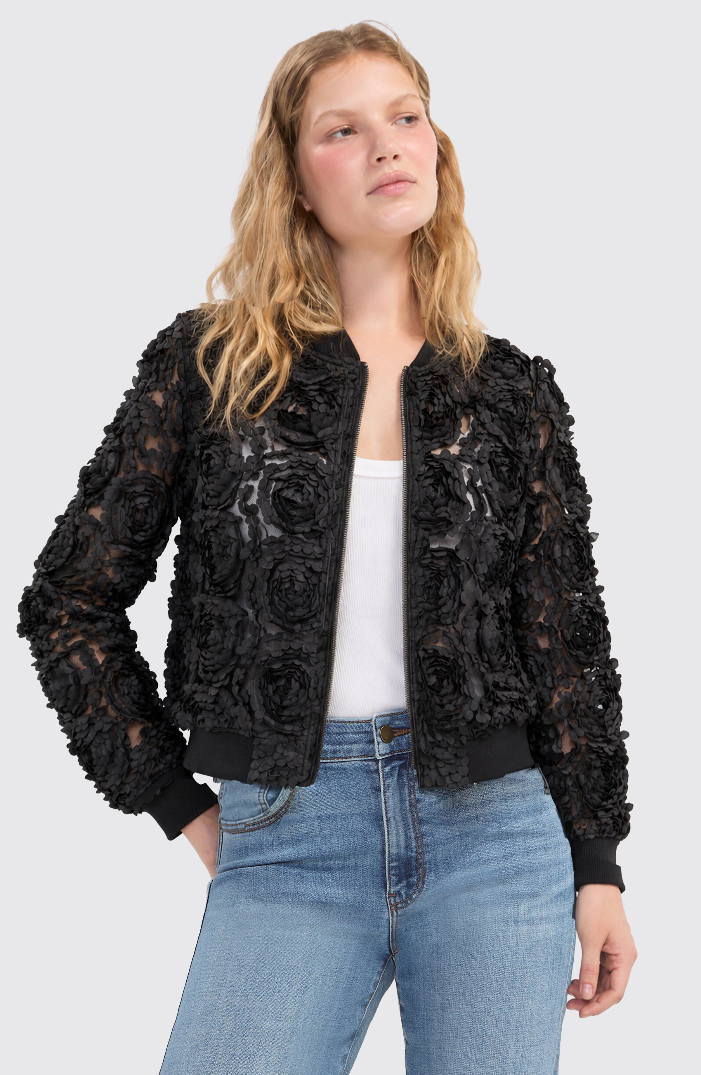 Liverpool black rosette bomber jacket styled with white tank and blue jeans on model