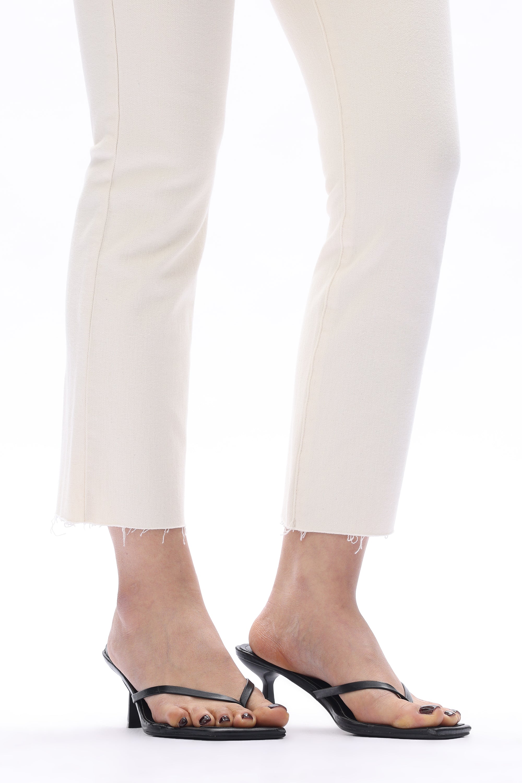 Off-white jeans, mid-rise straight leg, raw hem denim, women’s stretch jeans, cropped straight jeans, white denim trousers, chic casual wear. at ooh la la in Grapevine TX 76051