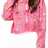 Queen of Sparkles Multi Groovy Heart Tie Up Sweater in hot pink at ooh la la! in Grapevine TX 76051